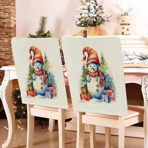 Detailed view of linen texture Christmas chair covers featuring snowman and tree patterns