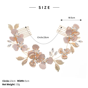 Detail view of pink flower bridal hair comb with size 23cm and weight 22g specs