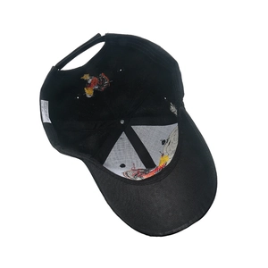 Black cotton baseball cap showing internal view with colorful rooster embroidery detail