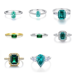 Collection of S925 silver emerald cut rings with radiant zircons in silver and gold