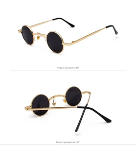 Detailed view of steampunk vintage small round sunglasses with gold metal frame and black lens