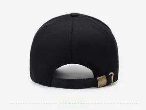 Detail of adjustable metal buckle and stitching on the back of a black cotton baseball cap