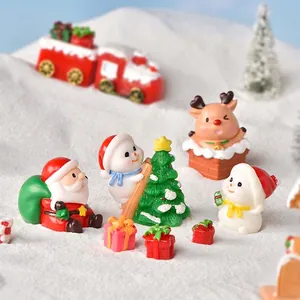 Christmas miniature resin figurine set featuring Santa, snowmen and reindeer for decor