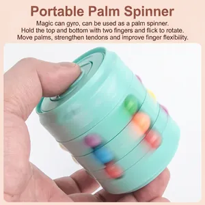 Rotating magic bean cube fidget spinner toy in mint green color for stress relief