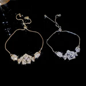 Elegant adjustable flower bracelets with sparkling cubic zirconia in gold and silver