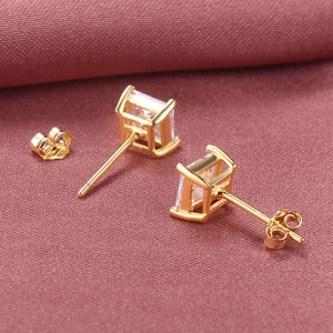 Classic gold S925 silver square zircon stud earrings on a textured brown fabric background
