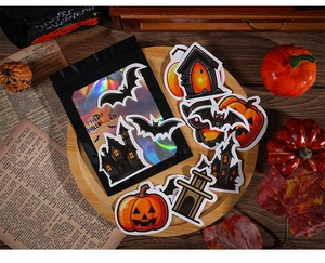 Halloween sticker set with holographic bag featuring pumpkin, bat and haunted house designs