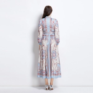 Back view of a long-sleeved floral maxi dress with court style patterns and slim waist