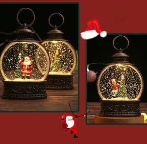 Detail of vintage Christmas snow globe lantern with Santa Claus scene and LED lights