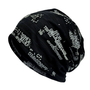 Winter street style black knit beanie with all-over white letter print and slouchy fit