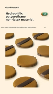 Gros plan de houppettes marron en polyuréthane souple pour une application de maquillage