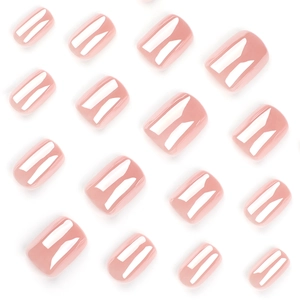 Glossy nude pink short square press-on nails with a smooth mirror finish on white background