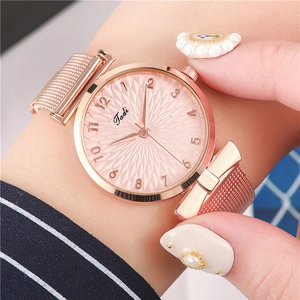 Orologio da donna al quarzo oro rosa con quadrante rosa testurizzato e maglia a fiocco