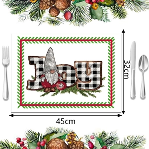 Mantel individual navideño con estampado JOY, Papá Noel y dimensiones 45cm x 32cm en mesa