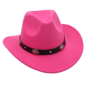 Detail of bright pink cowboy hat featuring black leather band and silver metal studs