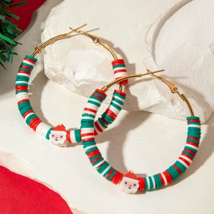 Macro detail of Christmas hoop earrings with colorful beads and Santa Claus charms