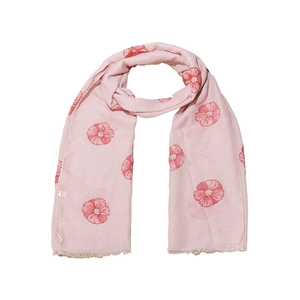 Close-up of pink floral print scarf with soft fringe edges and detailed fabric texture
