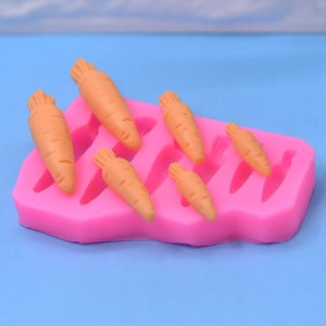 Pink carrot shaped silicone mold with six cavities for DIY cake baking and chocolate making