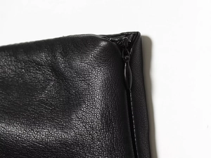 Détail du simili cuir de haute qualité avec fermeture à glissière lisse et couture fine