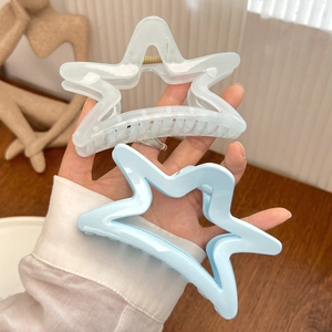 Star-shaped hair claws in translucent white and light blue, set of two hair accessories
