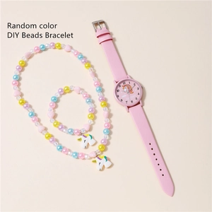 Detail of pink unicorn quartz watch set with matching beaded necklace and bracelet