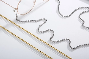 Detail of beaded titanium steel sunglasses chains in gold and silver with non-slip loops
