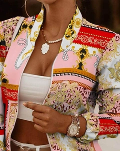 Detailed shot of full zipper and baroque print on lightweight slim fit jacket for women