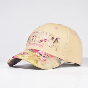 Close-up of beige canvas baseball cap with pink floral brim and 3D Aurora embroidery