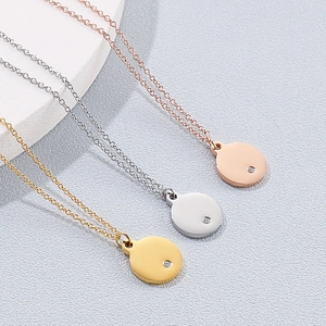 Minimalist stainless steel necklaces with round diamond pendants in gold, silver, rose gold