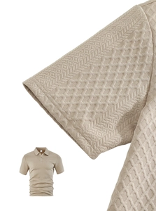 Macro shot of men's beige waffle knit polo shirt showing textured fabric and collar detail
