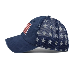 Washed cotton baseball cap with American flag patch and white star mesh back design