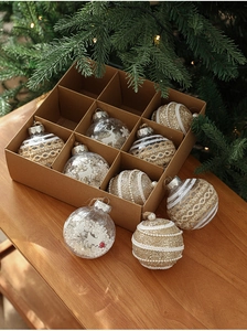 Christmas ball ornament set with glitter and patterns in a kraft paper gift box