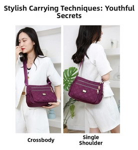 Detail view of purple quilted nylon shoulder bag with multiple gold zipper pockets and strap