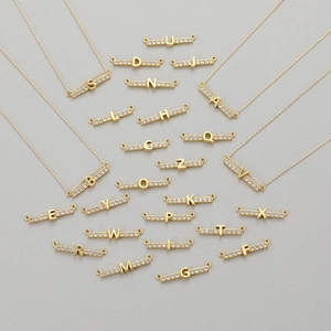 Gold letter pendants from A to Z with sparkling cubic zirconia inlay for necklaces
