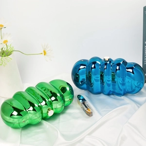 Cloud-shaped acrylic metallic clutch bag in vibrant blue and green for modern fashion styles