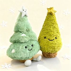 Plush Christmas tree dolls with smiling stars and soft festive textures in warm setting