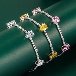 Pear-cut crystal bracelets in white, yellow, and pink with sparkling pave-set stones