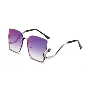 Frameless oversized sunglasses with purple gradient lenses and silver wavy metal temples