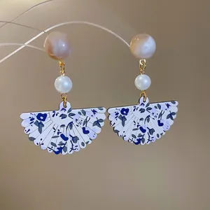 New Chinese style fan-shaped resin pearl earrings with blue floral patterns and gold accents