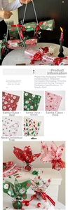 Detail of 50x68cm Christmas tissue paper with festive Santa and snowman prints