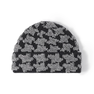 Women's thick knit houndstooth beanie with warm fleece texture for autumn and winter