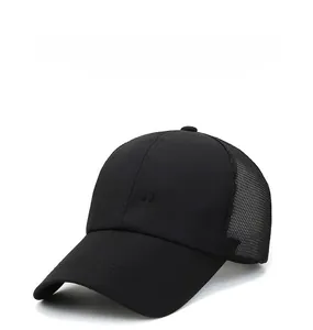 Detail of black sport cap featuring mesh panels and 3D embroidered SPORT lettering