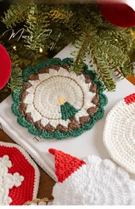Detail of handmade crochet Christmas coasters with festive holiday patterns and textures