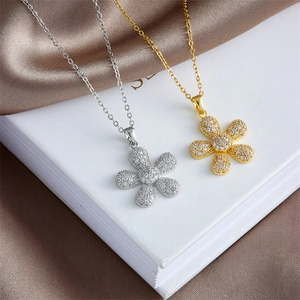 Sparkling sunflower pendant necklace with micro-pave cubic zirconia on steel chain