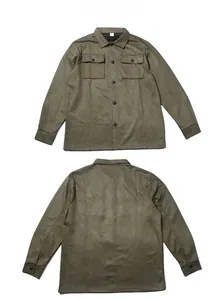 Detail of army green suede jacket set featuring front pockets and snap buttons