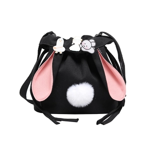Cute black canvas bunny ear drawstring bucket bag with plush tail and cartoon pins