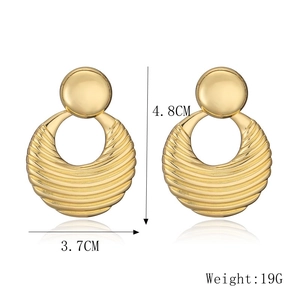 Detailed view of gold textured hoop earrings showing 4.8cm height and 3.7cm width dimensions