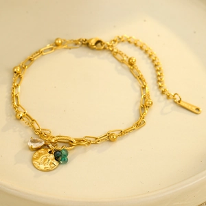 Gold-tone layered titanium steel bracelet with teardrop zircon and pearl charms