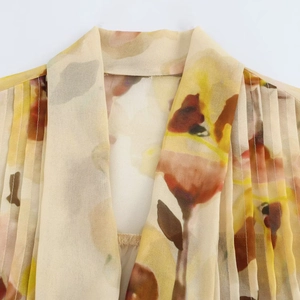 Chemisier femme à fleurs à manches longues avec col en V et épaules plissées jaune