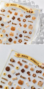Detail of 3D cartoon nail stickers featuring cute bears and coffee dessert motifs